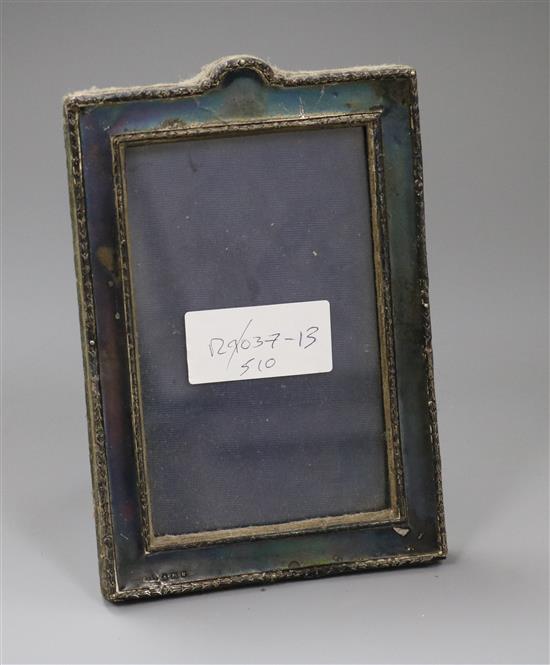 An Edwardian silver mounted photograph frame, Birmingham, 1909, 18.1cm.
